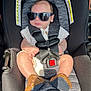 Wilson joined the competition — help win amazing prizes! baby, car_seat, sunglasses, infant, seatbelt, child, footwear, summer, sunlight, leather, clothing, safety, portrait, cute, fashion, expression, seat, restraint, person, infancy