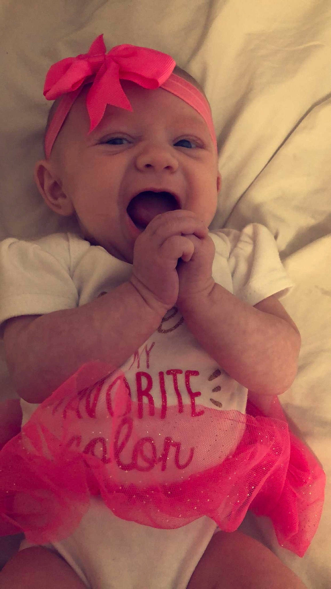 Zaylynn joined the competition — help win amazing prizes! baby, cheek, child, face, facial_expression, hair_accessory, happy, head, headgear, lip, mouth, nose, person, pink, skin, smile, toddler, yawn