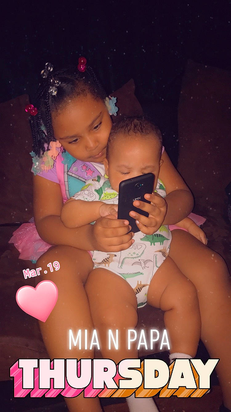 Amia joined the competition — help win amazing prizes! abdomen, baby, black_hair, cheek, child, diaper, finger, fun, happy, lap, leg, person, photo_caption, play, sitting, smile, thigh, thumb, toddler