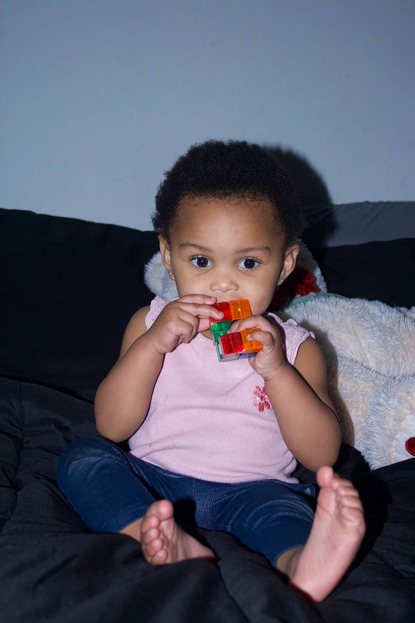 Kimani is registered to the contest to win money with this photo: baby, baby_toddler_clothing, cheek, child, comfort, couch, event, finger, flash_photography, fun, hand, happy, iris, lip, nail, nose, person, sitting, skin, sweetness