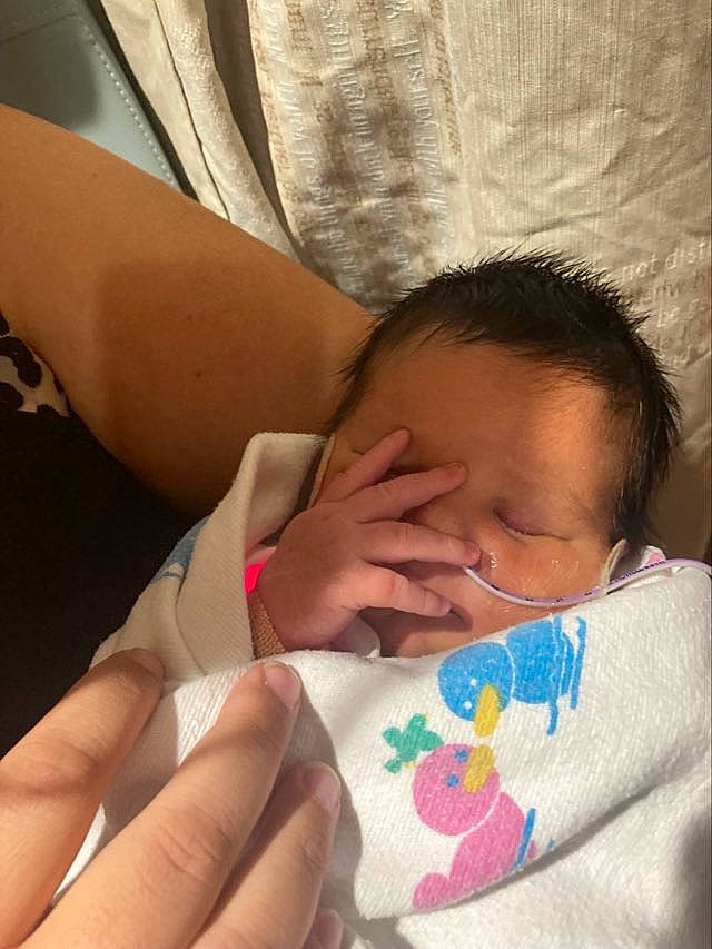 Vani is registered to the contest to win money with this photo: baby, baby_sleeping, baby_toddler_clothing, child, comfort, elbow, eyelash, finger, gesture, hand, happy, human_leg, linens, nail, neck, nose, person, skin, thumb, toddler