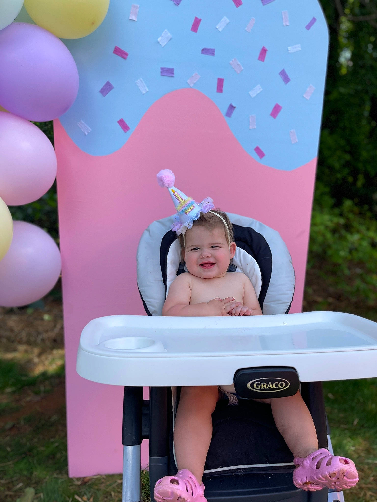 Leighton joined the competition — help win amazing prizes! baby_toddler_clothing, balloon, facial_expression, fun, grass, happy, joy, leisure, magenta, outdoor_furniture, person, pink, plant, product, purple, red, shoe, sneakers, summer, toddler