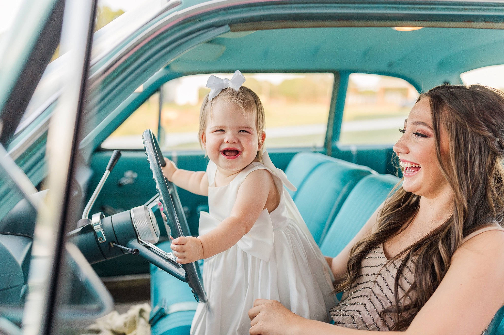 Leighton joined the competition — help win amazing prizes! automotive_design, automotive_exterior, bridal_clothing, car, dress, facial_expression, flash_photography, happy, joy, land_vehicle, leisure, motor_vehicle, person, personal_luxury_car, photograph, recreation, smile, snapshot, steering_wheel, toddler