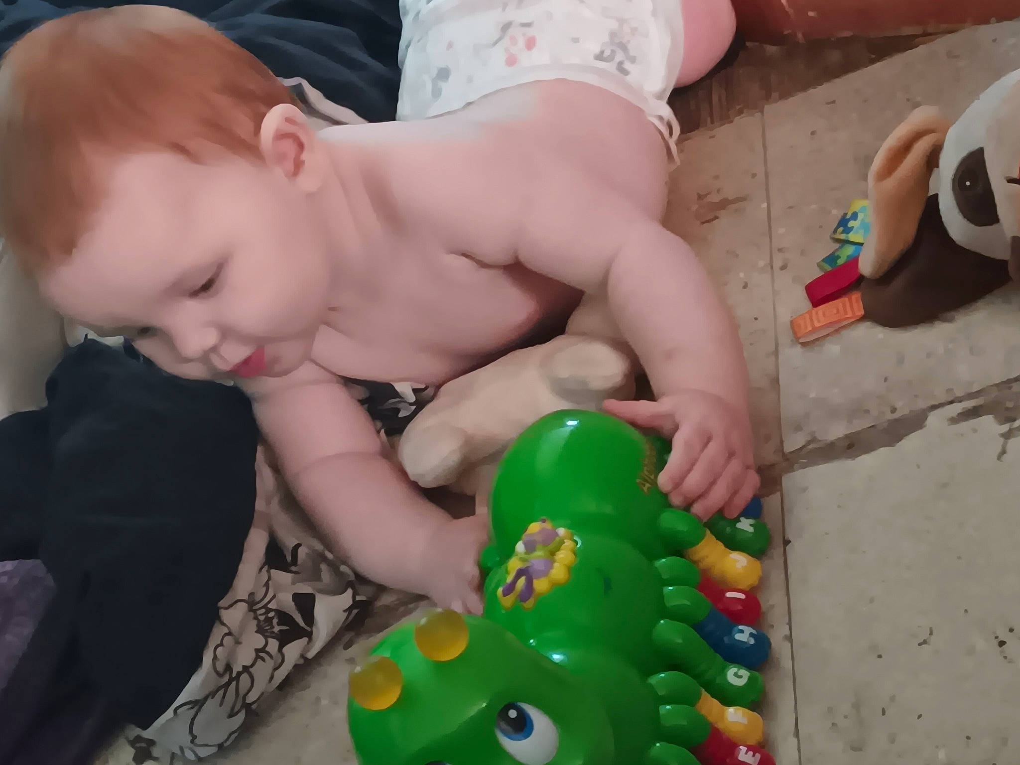 Zaylynn joined the competition — help win amazing prizes! abdomen, baby, baby_playing_with_toys, baby_products, baby_toys, barechested, chest, child, fun, grass, idiophone, leisure, musical_instrument, person, plastic, play, sitting, stuffed_toy, toddler, toy