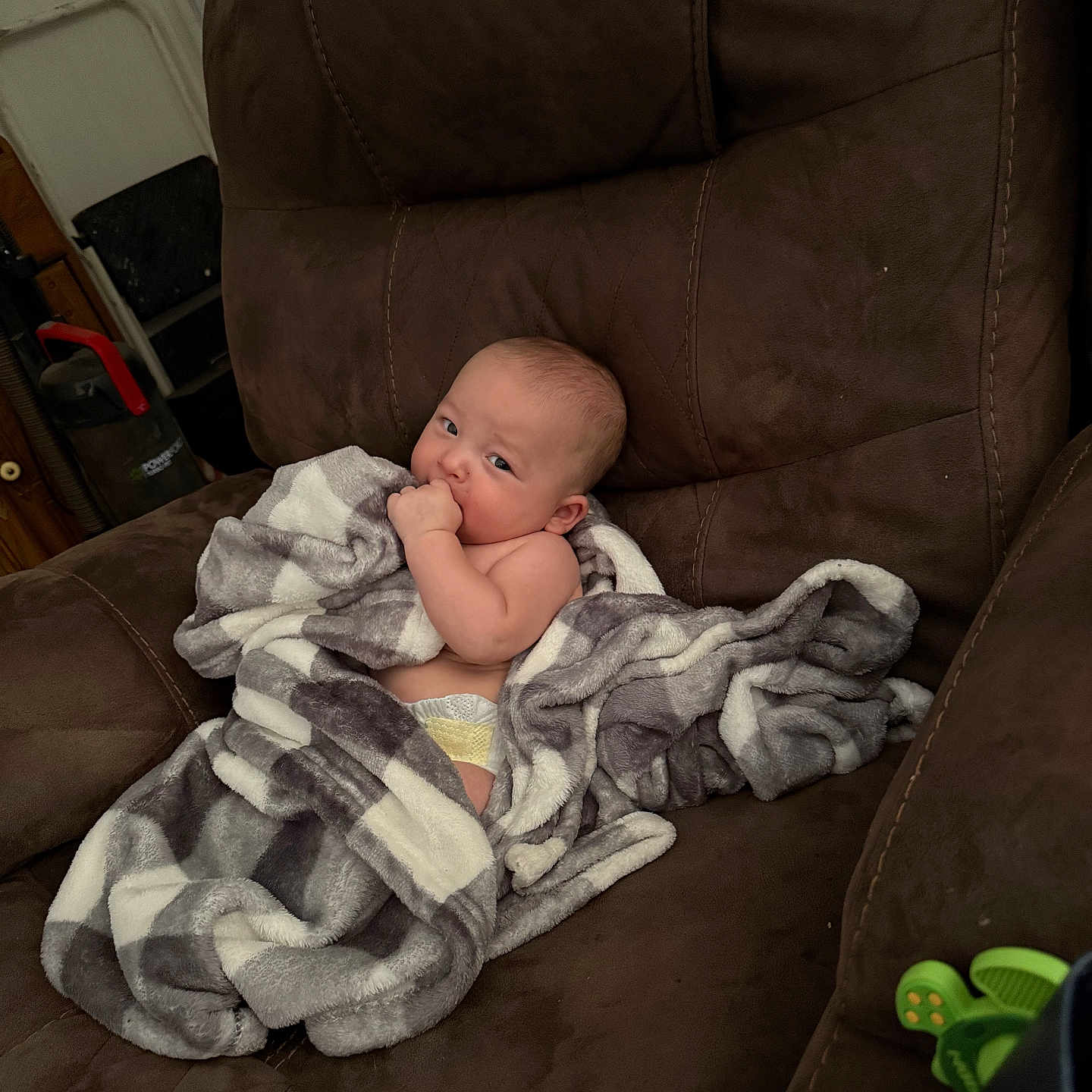 Charles joined the competition — help win amazing prizes! baby, blanket, brown_furniture, child, comfort, couch, cute, diaper, furniture, home, indoor, infant, living_room, person, plaid, recliner, seat, soft_texture, toy, young_child