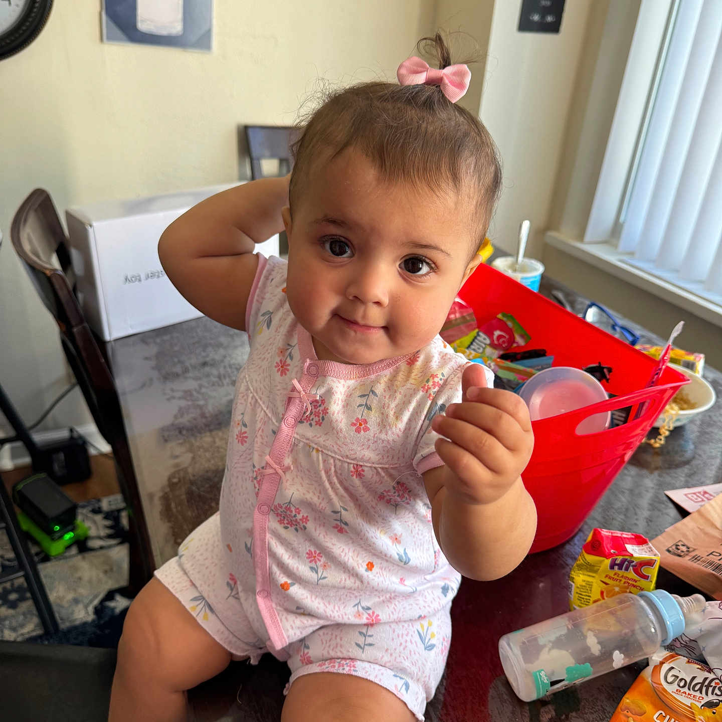 Kehlani joined the competition — help win amazing prizes! baby, bodypart, box, clothing, cutlery, face, finger, footwear, hand, head, indoors, medication, person, photography, portrait, shoe, shorts, sitting, spoon, wood