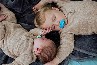 Korbyn joined the competition — help win amazing prizes! baby, baby_toddler_clothing, cheek, child, comfort, fur, grass, iris, natural_material, person, sitting, skin, sleeve, toddler