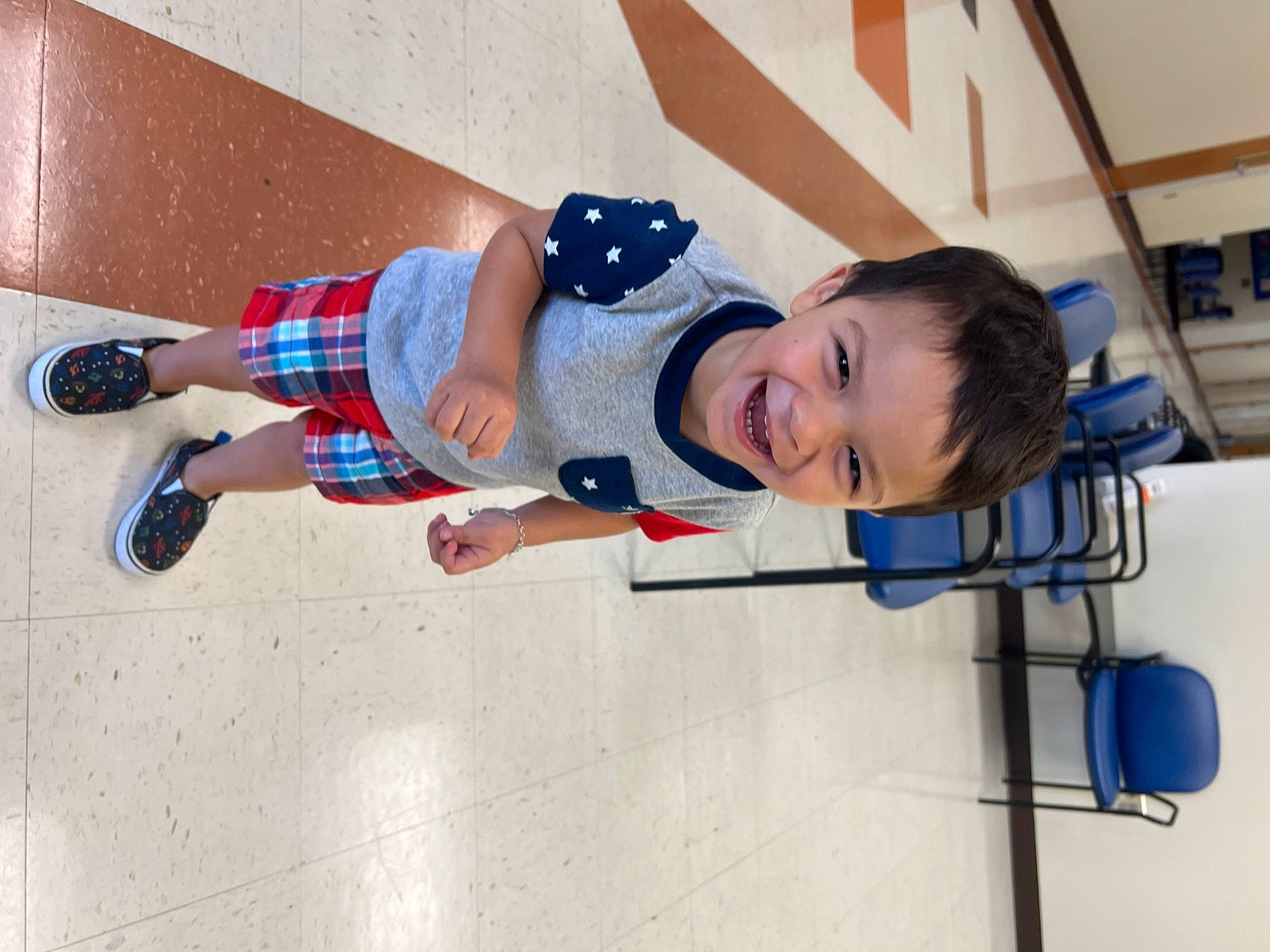 Niko is registered to the contest to win money with this photo: child, clothing, concrete, elbow, electric_blue, fun, happy, hat, human_leg, joy, knee, leisure, pattern, person, play, recreation, smile, sports_equipment, t_shirt, toddler