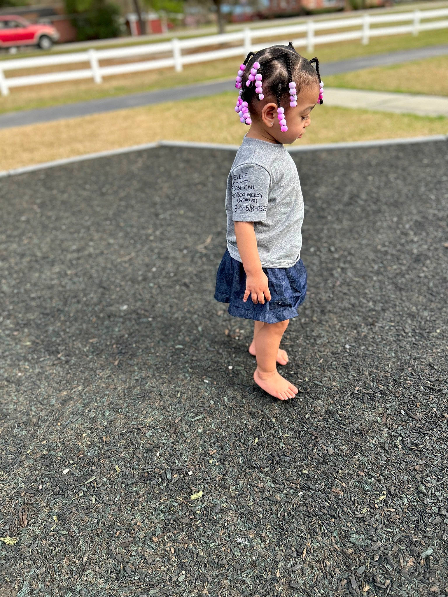 Ellee joined the competition — help win amazing prizes! asphalt, child, denim, electric_blue, eyewear, fashion_accessory, fun, grass, human_leg, leisure, pattern, person, play, recreation, road, road_surface, shadow, sidewalk, soil, toddler