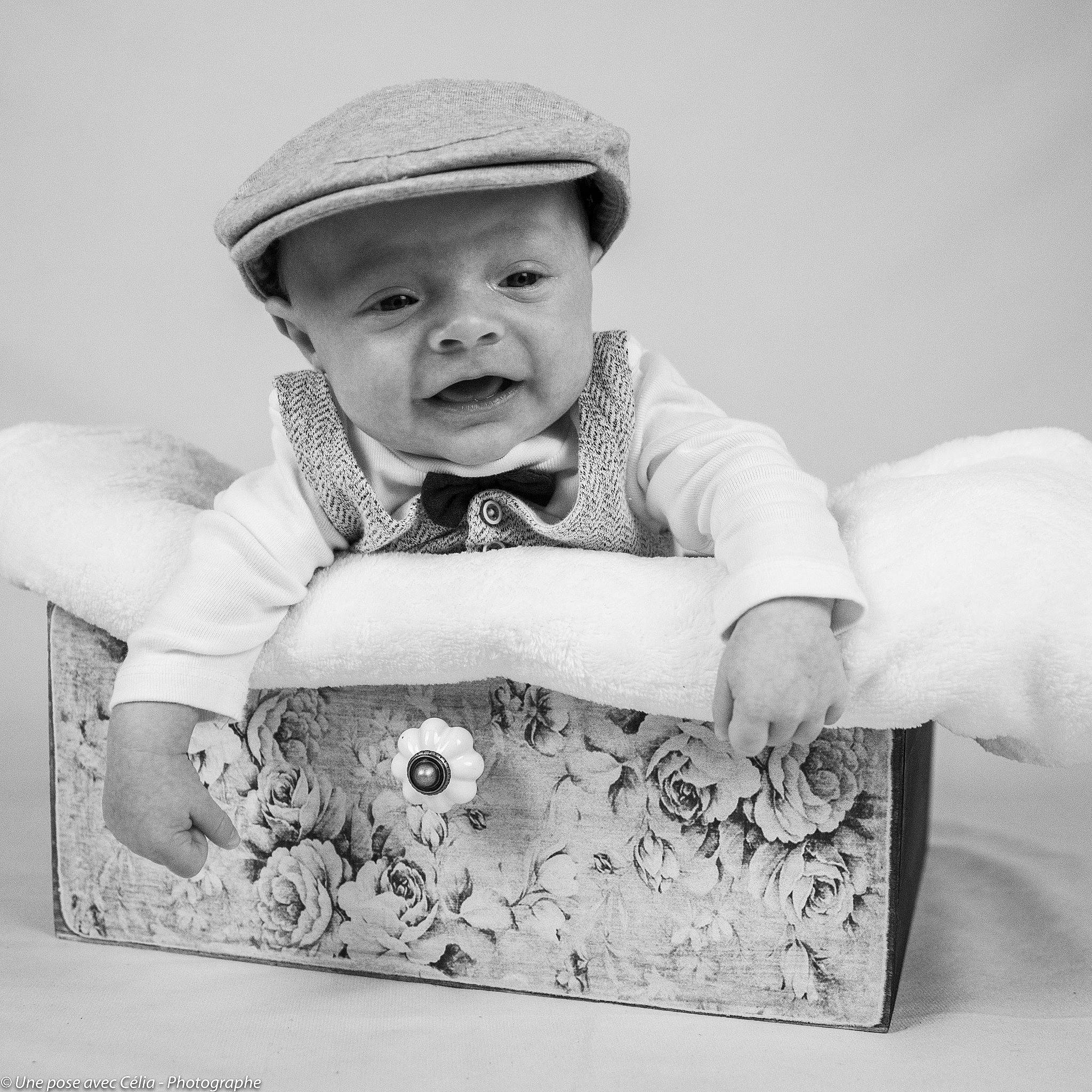 Milo participe au concours pour gagner de l'argent avec cette photo : baby, baby_toddler_clothing, black_and_white, cap, child, facial_expression, fashion_accessory, flash_photography, fun, hairstyle, happy, headwear, monochrome, monochrome_photography, person, product, sitting, sleeve, smile, stock_photography