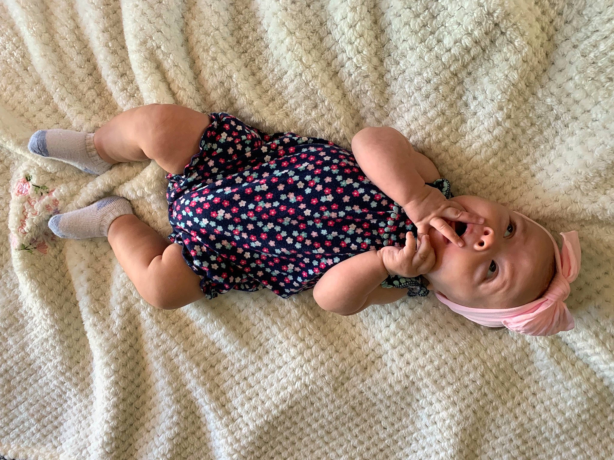 Laylah joined the competition — help win amazing prizes! baby, baby_products, baby_toddler_clothing, child, comfort, finger, foot, hand, human_leg, knee, linens, pattern, person, sitting, skin, sleeve, sock, textile, thigh, toddler