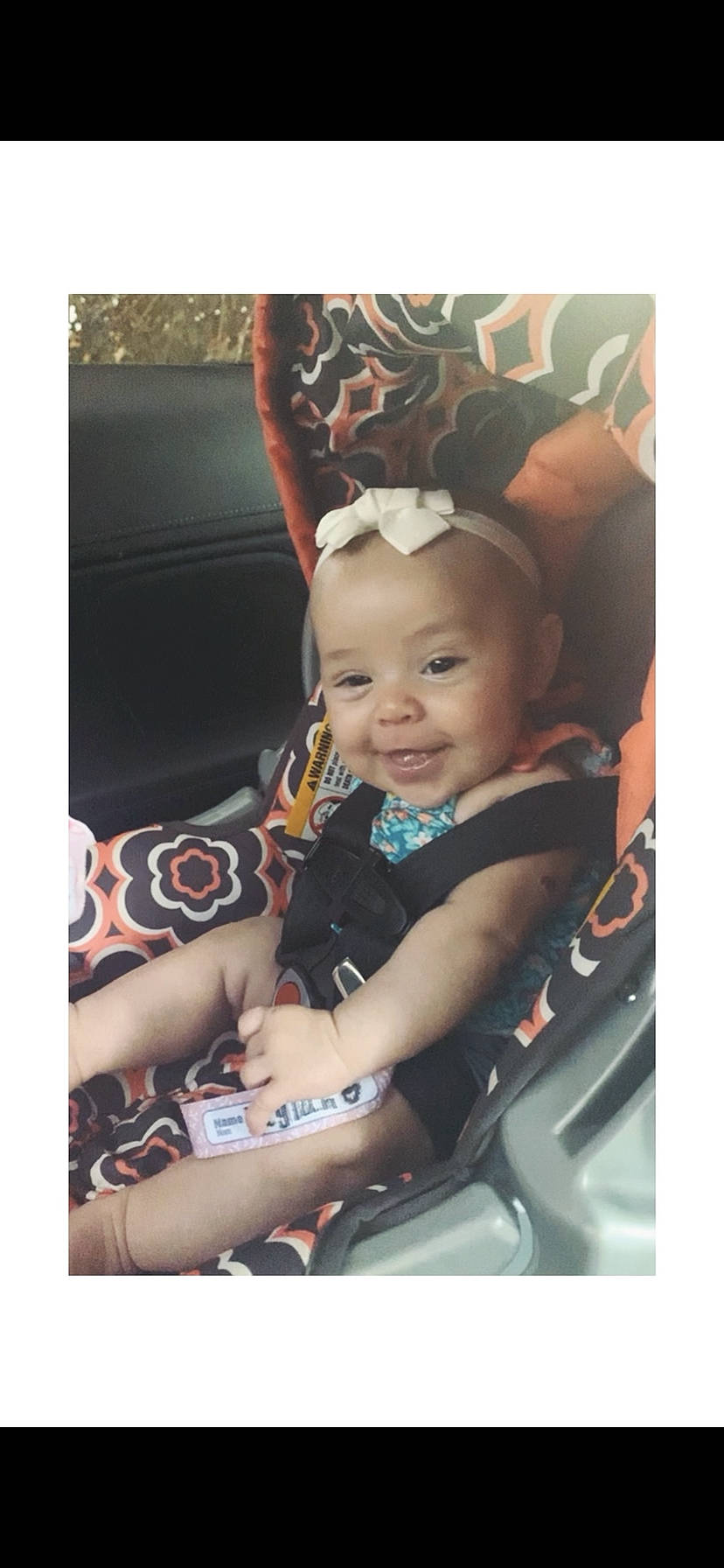 Laylah is registered to the contest to win money with this photo: auto_part, automotive_design, automotive_wheel_system, baby, baby_carriage, baby_products, baby_toddler_clothing, car_seat, child, comfort, family_car, fashion_accessory, flash_photography, happy, joy, luxury_vehicle, person, sitting, smile, toddler