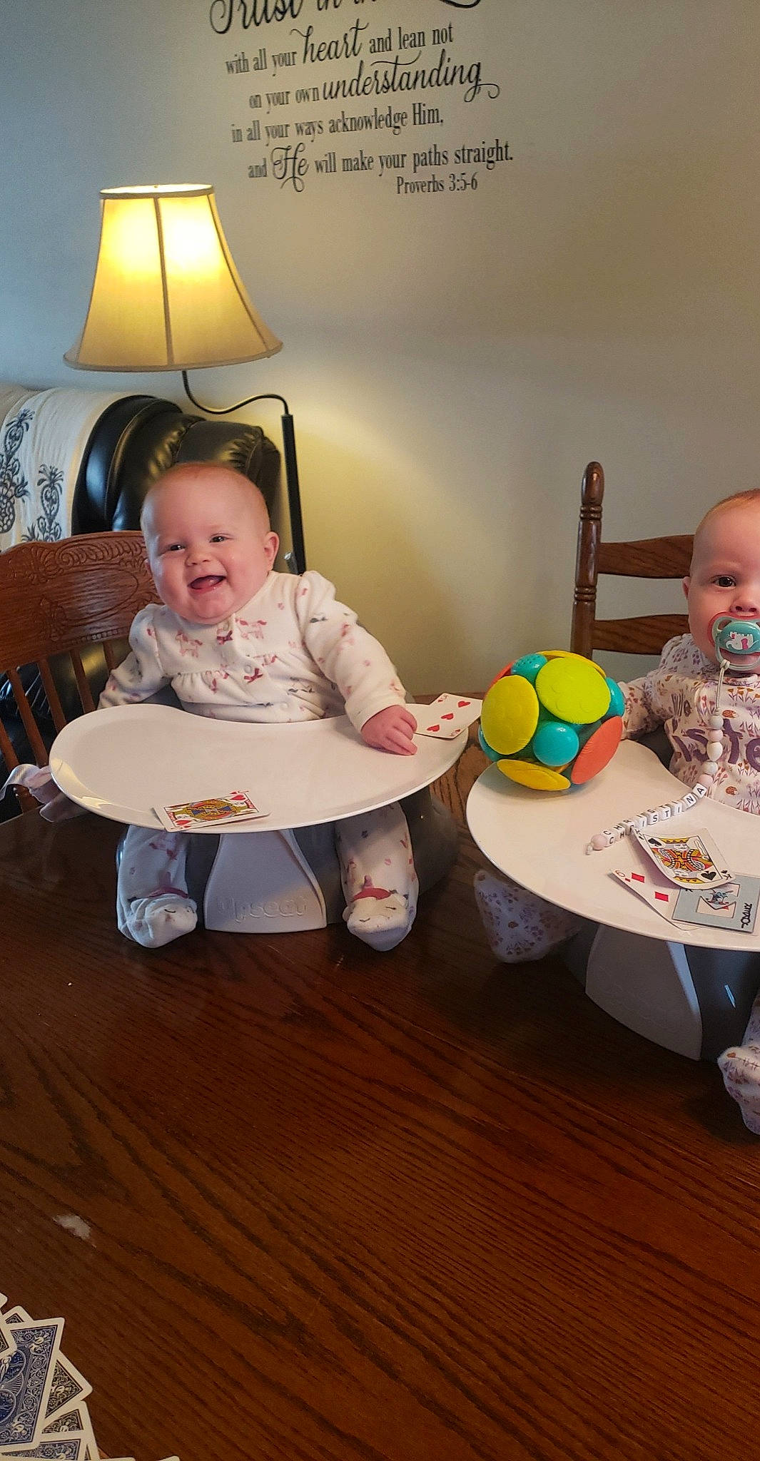 Christina And Camryn is registered to the contest to win money with this photo: baby, baby_playing_with_toys, baby_toddler_clothing, child, comfort, flooring, fun, happy, hardwood, joy, lamp, person, picture_frame, room, sharing, smile, table, tableware, toddler, toy