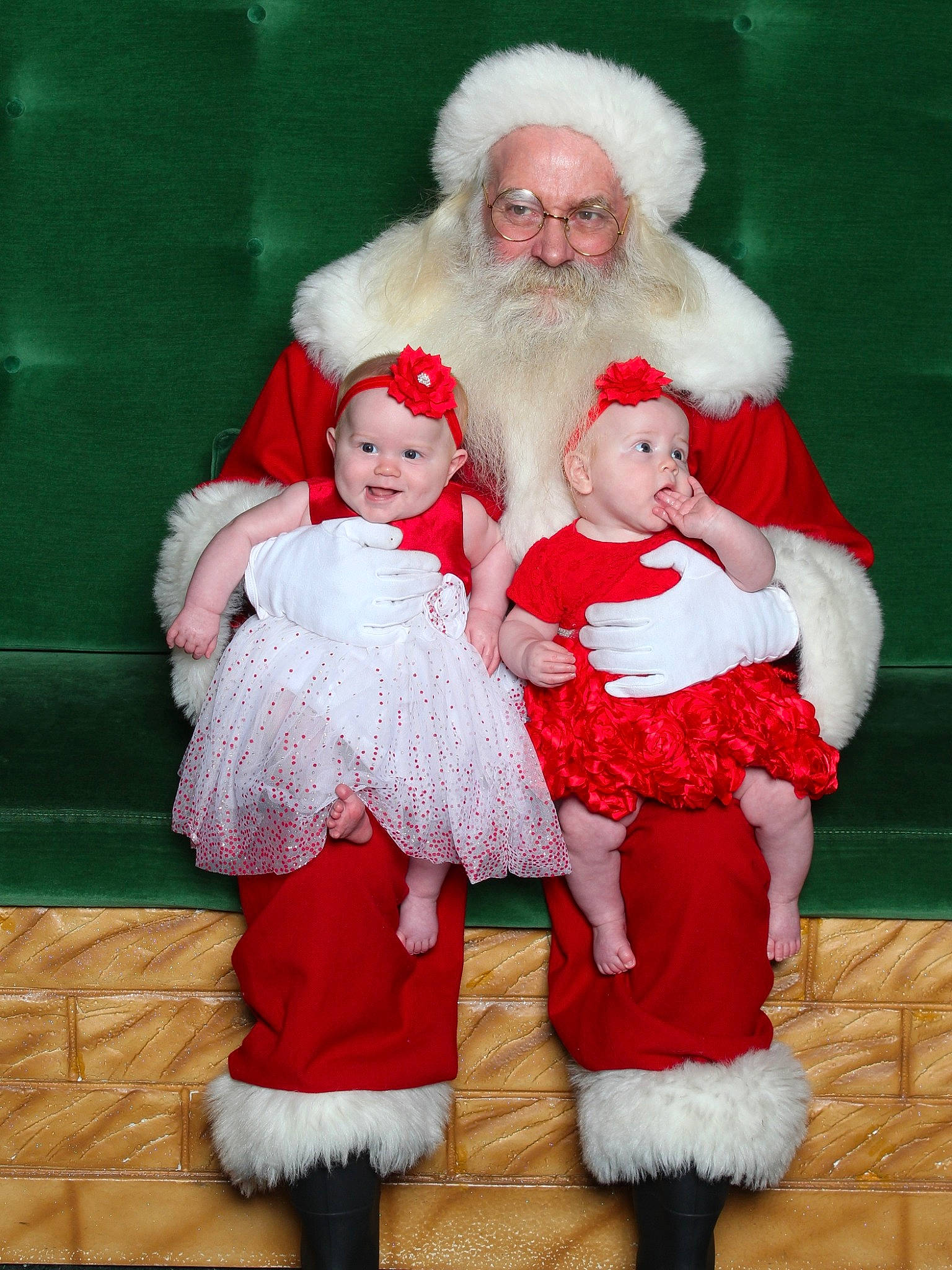 Christina And Camryn joined the competition — help win amazing prizes! baby, baby_toddler_clothing, beard, event, fictional_character, green, happy, hat, headgear, headwear, holiday, human_body, lap, leg, organ, person, photograph, red, santa_claus, sleeve