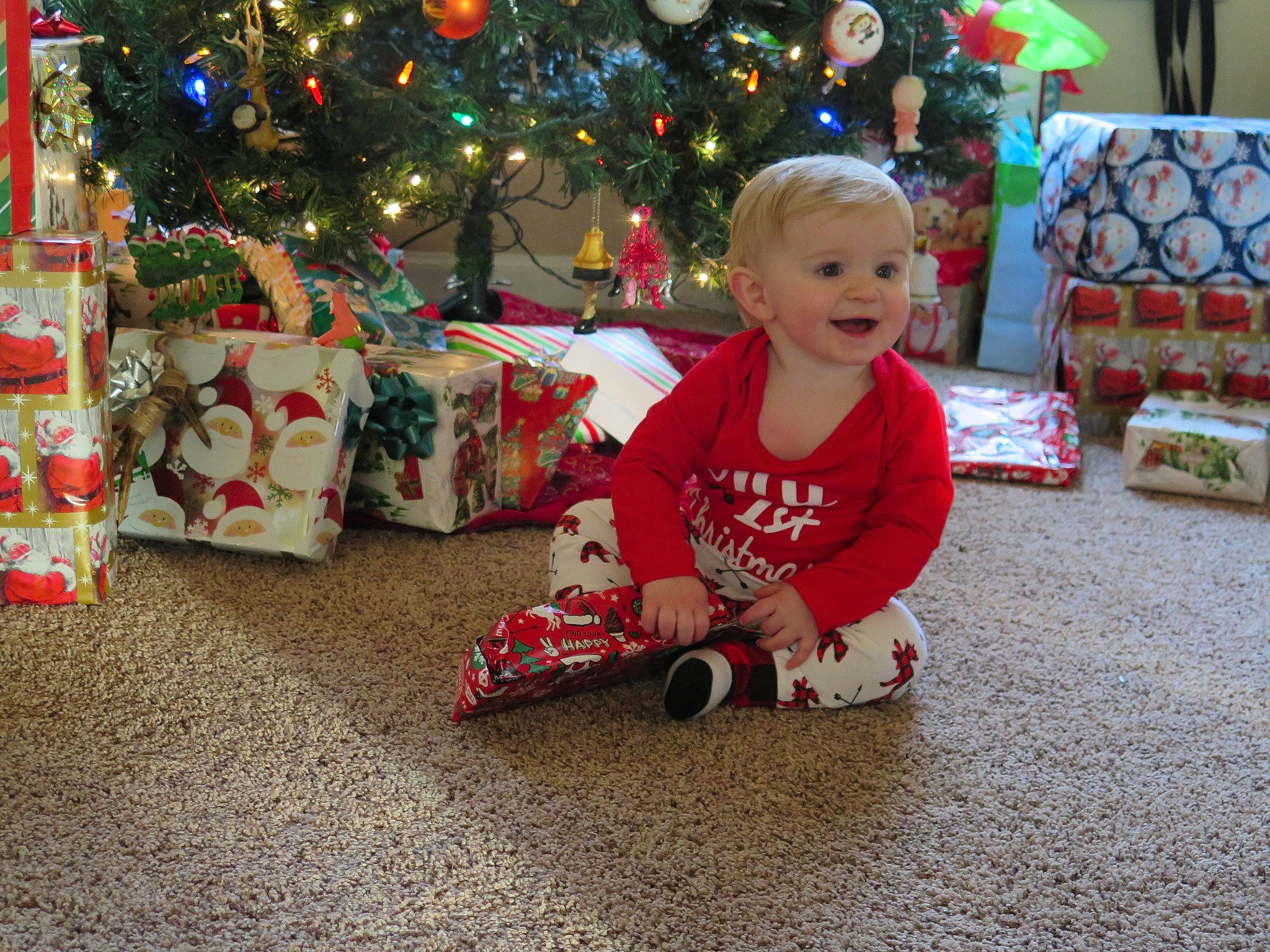 Robbie joined the competition — help win amazing prizes! child, christmas, christmas_decoration, christmas_eve, christmas_ornament, christmas_tree, event, holiday, interior_design, opening_presents, person, play, toddler, tree