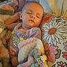 baby, blanket, child, clothing, comfort, cute, floral_pattern, head, indoors, infant, nap, pastel_colors, peace, peaceful, person, pillow, relaxation, rest, sleeping, soft_texture