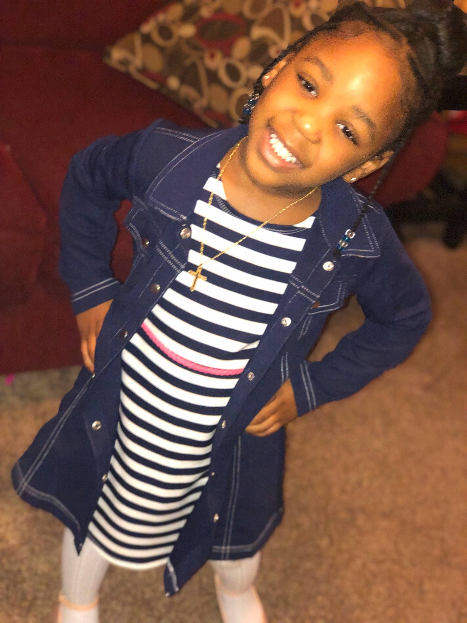 Nyomi is registered to the contest to win money with this photo: black_hair, child, child_model, joy, outerwear, person, skin, smile, toddler