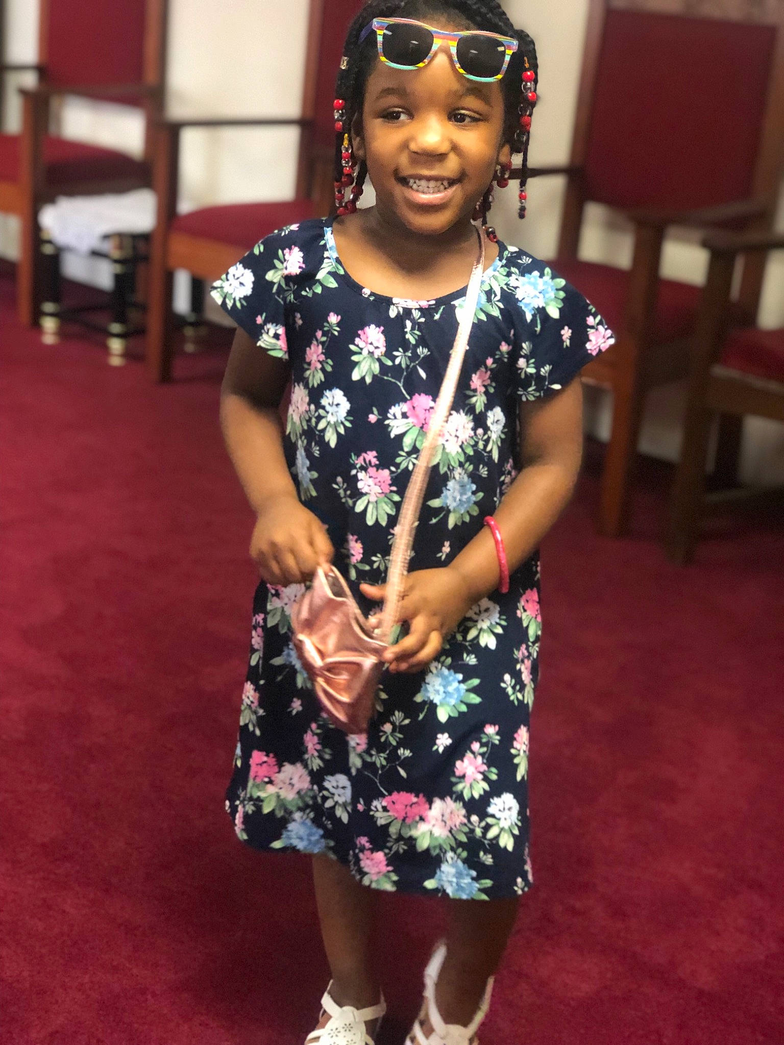 Nyomi is registered to the contest to win money with this photo: black_hair, child, cool, dress, eyewear, fashion, fashion_design, footwear, fun, glasses, head, joy, person, shoe, style, sunglasses, toddler, vision_care