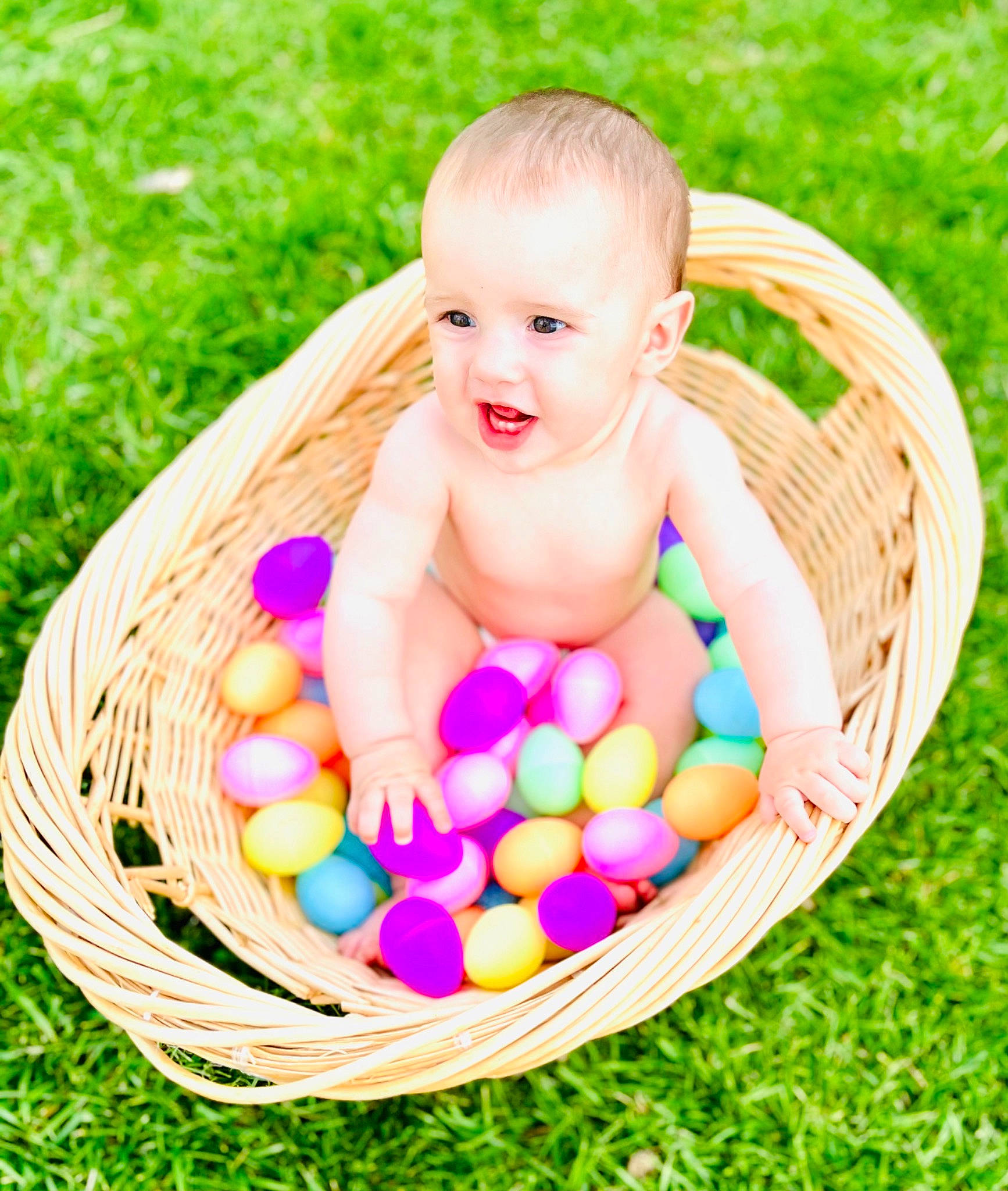 Hunter is registered to the contest to win money with this photo: baby, baby_playing_with_toys, baby_toddler_clothing, basket, child, easter, easter_egg, event, grass, happy, holiday, leisure, people_in_nature, person, picnic_basket, recreation, smile, storage_basket, sweetness, toddler