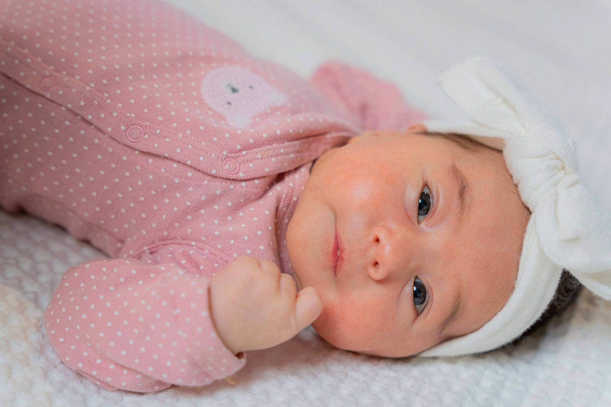 Aylin is registered to the contest to win money with this photo: baby, baby_toddler_clothing, cheek, child, comfort, happy, hat, headgear, headwear, iris, linens, lip, nose, pattern, person, pink, portrait_photography, skin, sleeve, smile