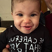 Kyzley joined the competition — help win amazing prizes! adult, baby, black_shirt, child, closeup, clothing, cute, expression, eyes, face, hair, hand, happy, holding, indoor, person, portrait, skin, smiling, white_text