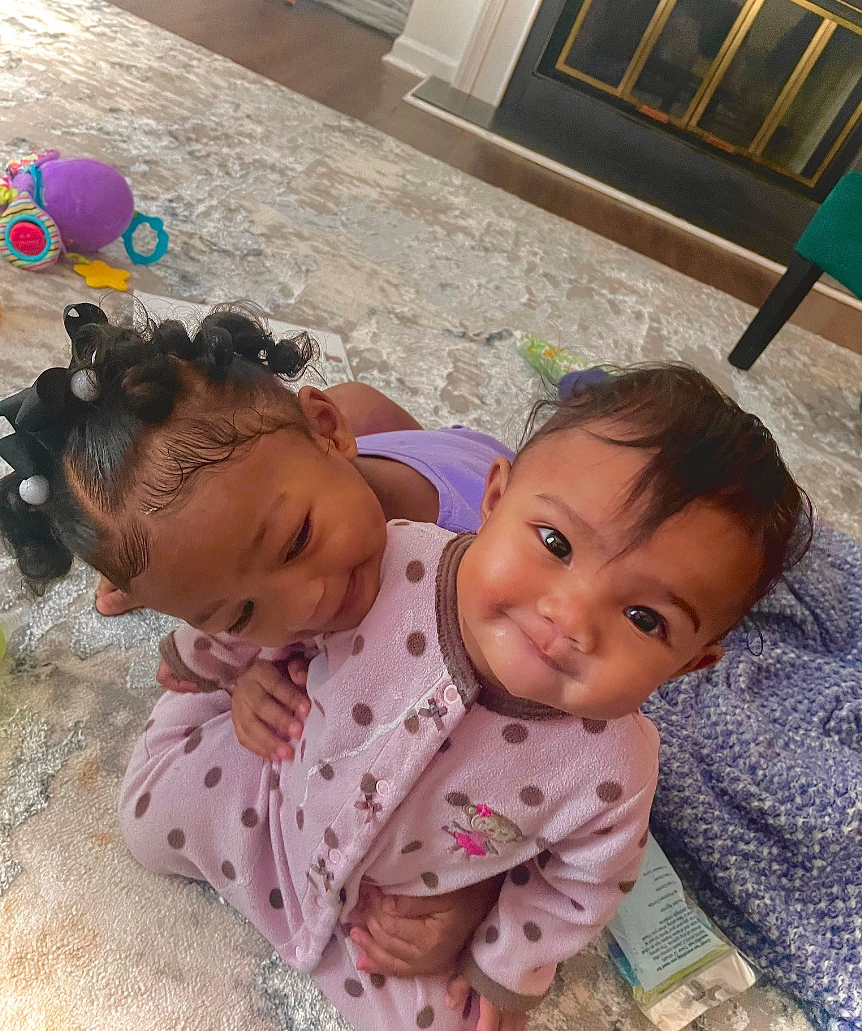 Kodi Nalani Williams is registered to the contest to win money with this photo: baby, baby_toddler_clothing, balloon, black_hair, cheek, child, ear, eye, eyebrow, flooring, fun, happy, iris, nose, person, play, sitting, skin, smile, toddler