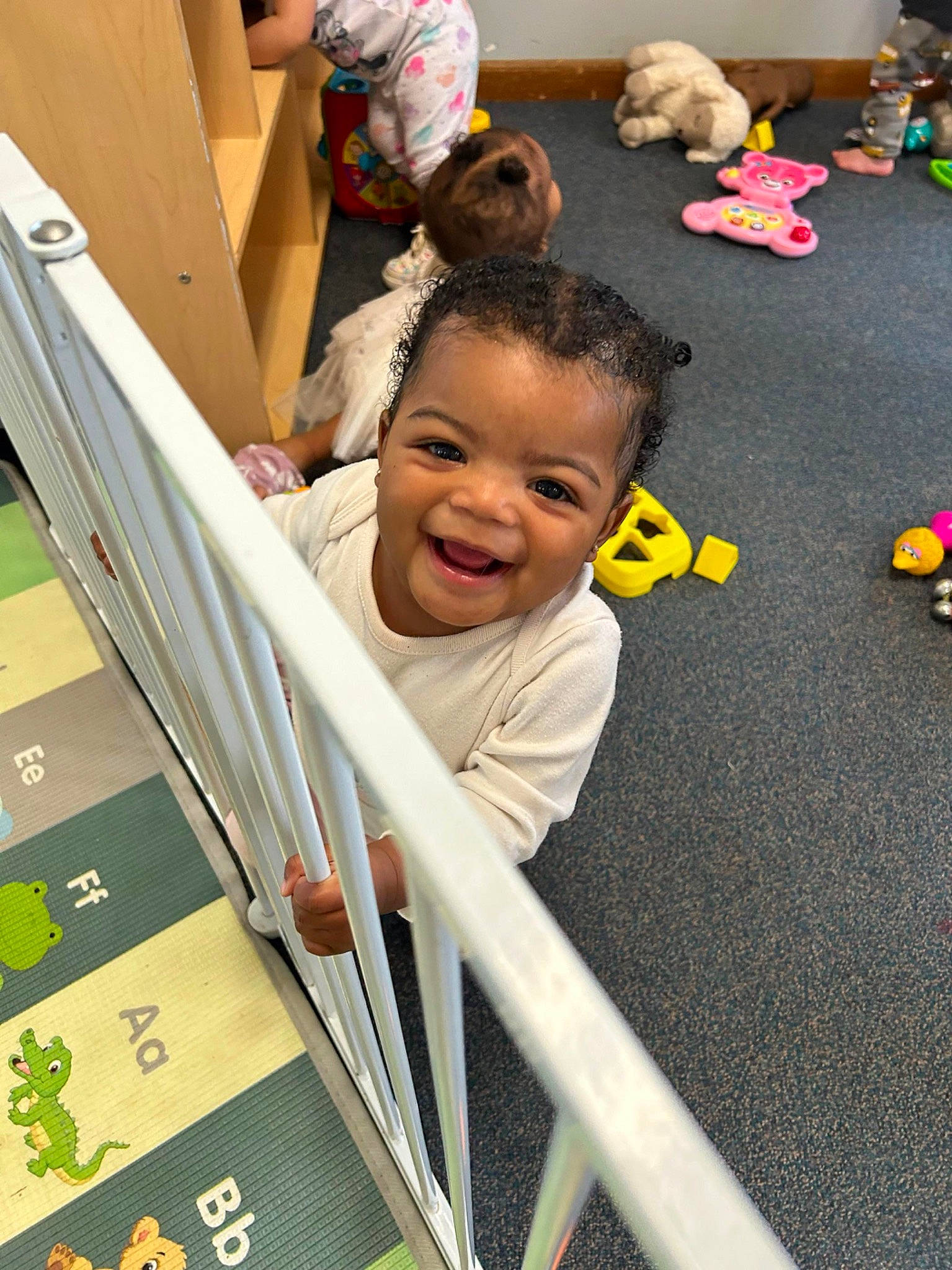Alayah joined the competition — help win amazing prizes! baby, baby_products, baby_safety, child, flooring, fun, happy, leisure, person, play, product, room, sitting, smile, snapshot, t_shirt, toddler, toy, vacation, wood