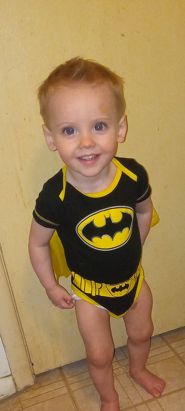 Brayden is registered to the contest to win money with this photo: baby, baby_toddler_clothing, cheek, child, clothing, hair, happy, human_body, human_leg, joy, knee, neck, one_piece_swimsuit, pattern, person, sleeve, smile, sportswear, t_shirt, thigh