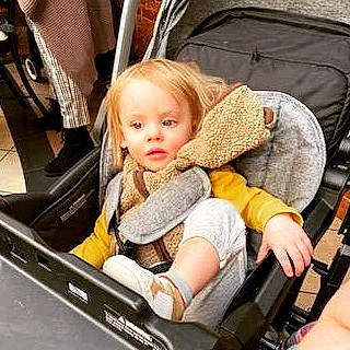 Brayden is registered to the contest to win money with this photo: auto_part, automotive_exterior, baby, baby_carriage, baby_products, baby_safety, blond, car_seat, child, comfort, eye, family_car, lap, motor_vehicle, person, sitting, steering_wheel, toddler, travel, vehicle_door