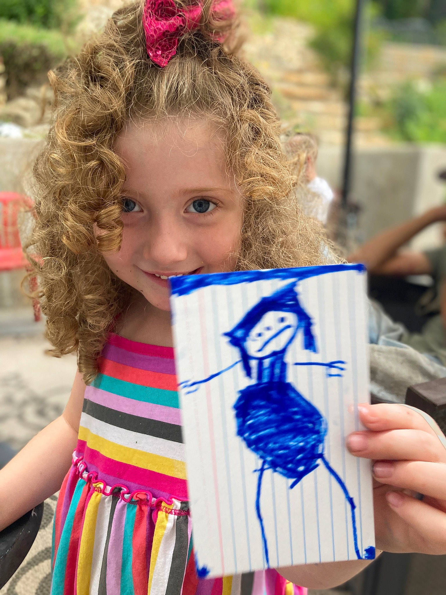 Scarlett is registered to the contest to win money with this photo: blond, child, community, cool, electric_blue, eye, fun, hairstyle, hand, happy, head, iris, joy, leisure, person, pink, recreation, red, t_shirt, textile