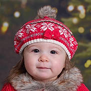 Celena is registered to the contest to win money with this photo: baby, beanie, bonnet, cap, clothing, face, hair, happy, hat, head, hood, knitwear, person, photography, portrait, smile, sweater, sweatshirt