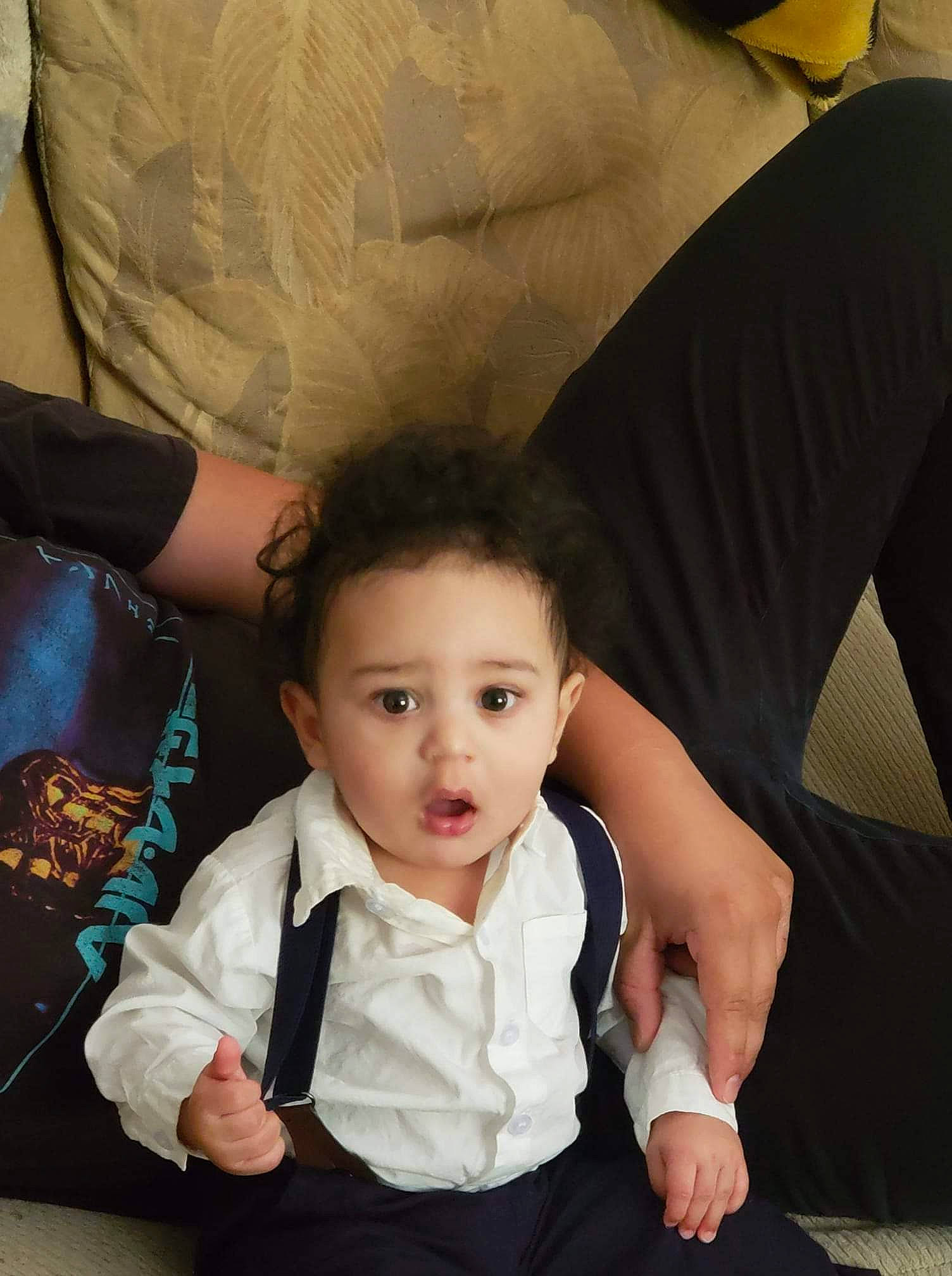 Malik joined the competition — help win amazing prizes! baby, baby_toddler_clothing, chair, cheek, child, comfort, cool, couch, eye, finger, flash_photography, fun, gesture, hairstyle, hand, happy, iris, person, skin, sleeve