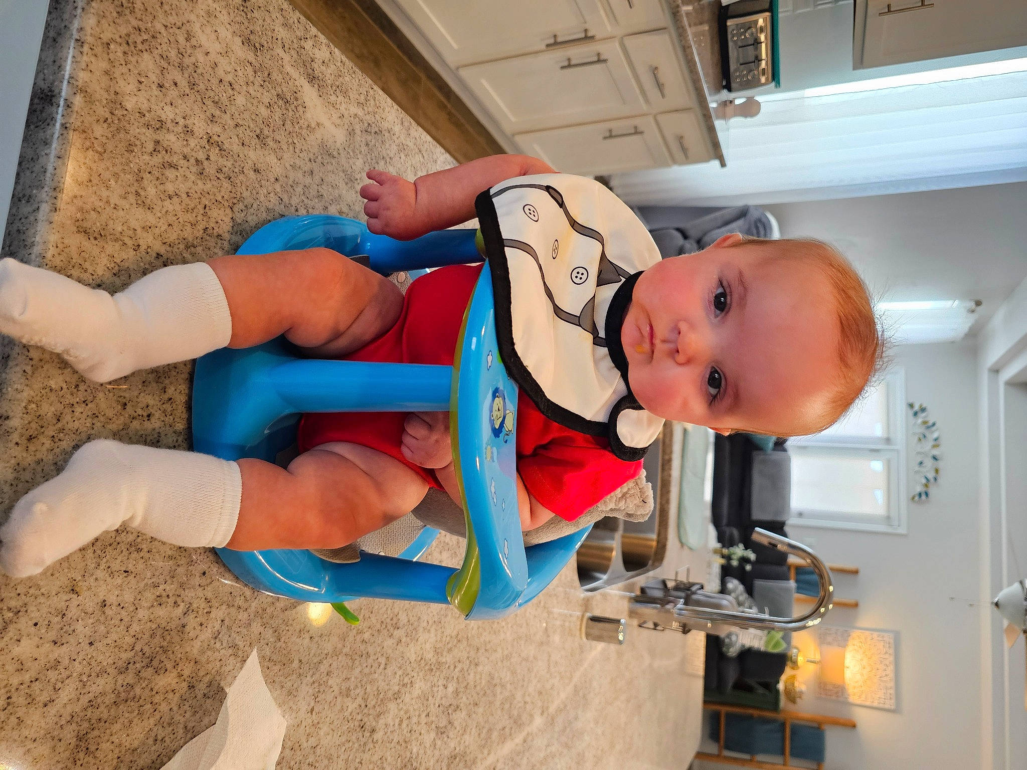 Ezekiel joined the competition — help win amazing prizes! abdomen, baby, child, costume, electric_blue, fictional_character, fun, hat, home_appliance, human_leg, knee, leg, leisure, machine, orange, person, personal_protective_equipment, room, sock, thigh