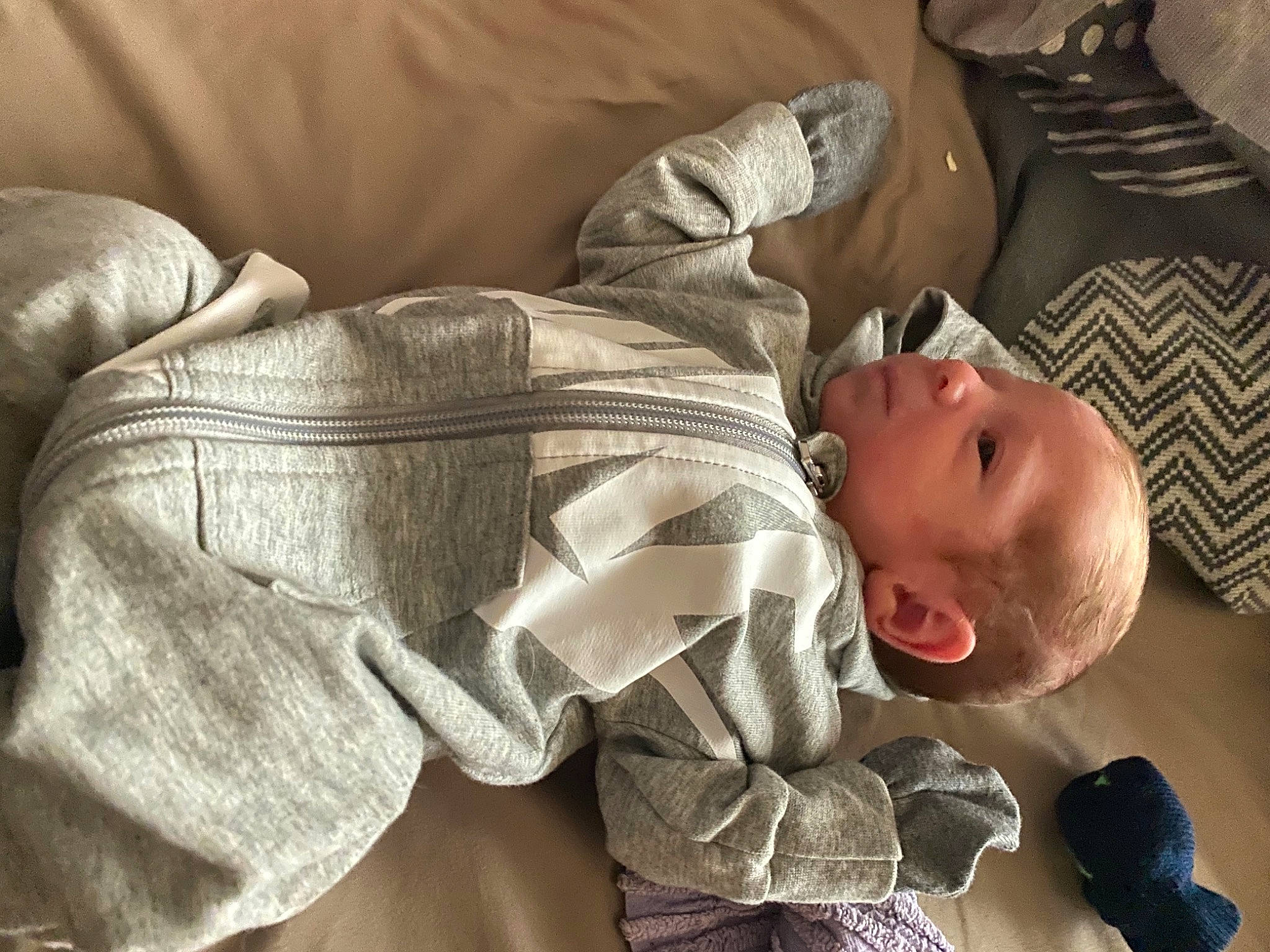 Shea is registered to the contest to win money with this photo: arm, baby, baby_carriage, baby_products, baby_sleeping, baby_toddler_clothing, bedtime, cheek, child, comfort, finger, hand, linens, mouth, nap, person, sitting, skin, textile, toddler