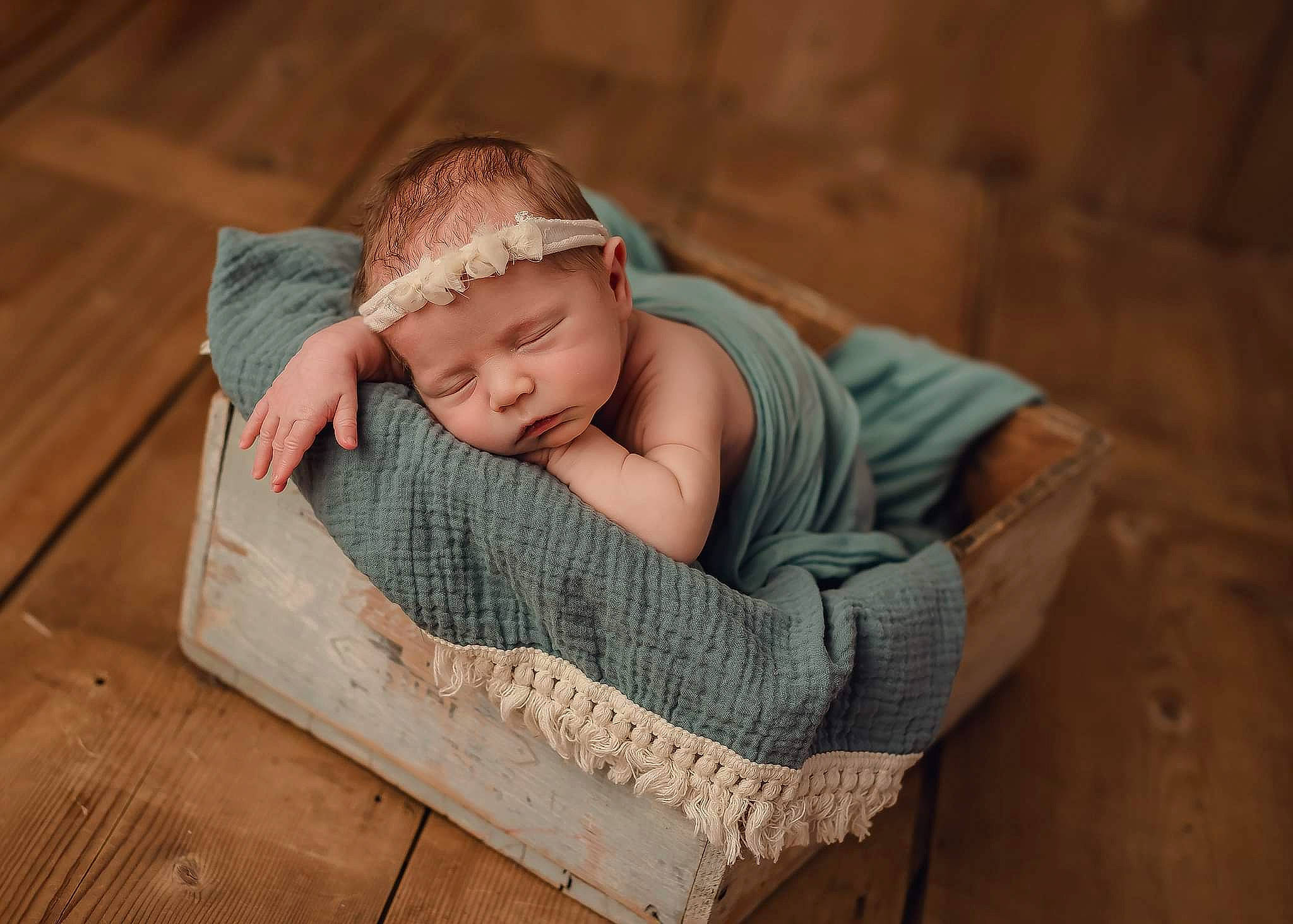 Collins is registered to the contest to win money with this photo: baby, baby_products, baby_sleeping, baby_toddler_clothing, child, comfort, flooring, grass, hand, hardwood, headgear, headwear, infant_bed, linens, pattern, person, portrait_photography, sitting, skin, toddler