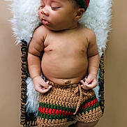 Xonyx is registered to the contest to win money with this photo: baby, basket, blanket, child, cozy, crochet, cushion, cute, handmade, hat, infant, newborn, peaceful, portrait, resting, shorts, skin, sleep, sleeping, slippers