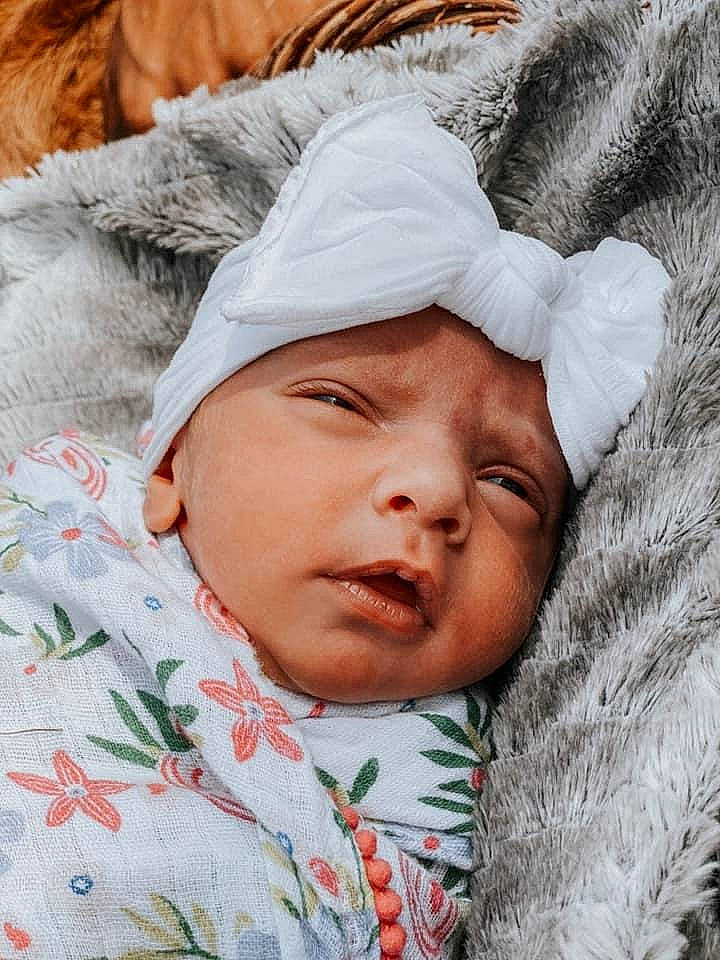 Braxlynn joined the competition — help win amazing prizes! baby, cheek, child, eye, face, head, headgear, headwear, lip, nose, person, skin, sleep, smile, toddler, winter