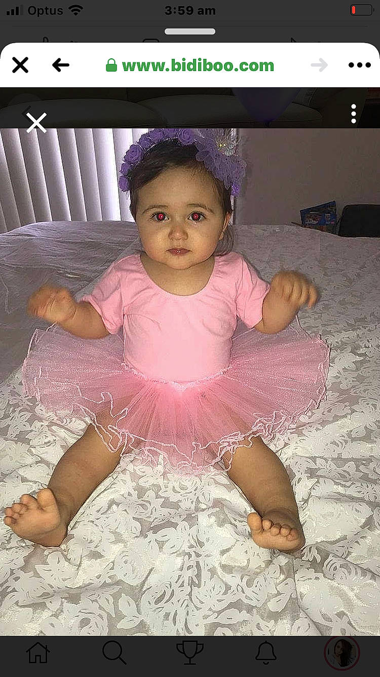 Armani is registered to the contest to win money with this photo: baby, baby_toddler_clothing, child, design, fun, head, pattern, person, photo_caption, pink, product, sitting, skin, smile, toddler