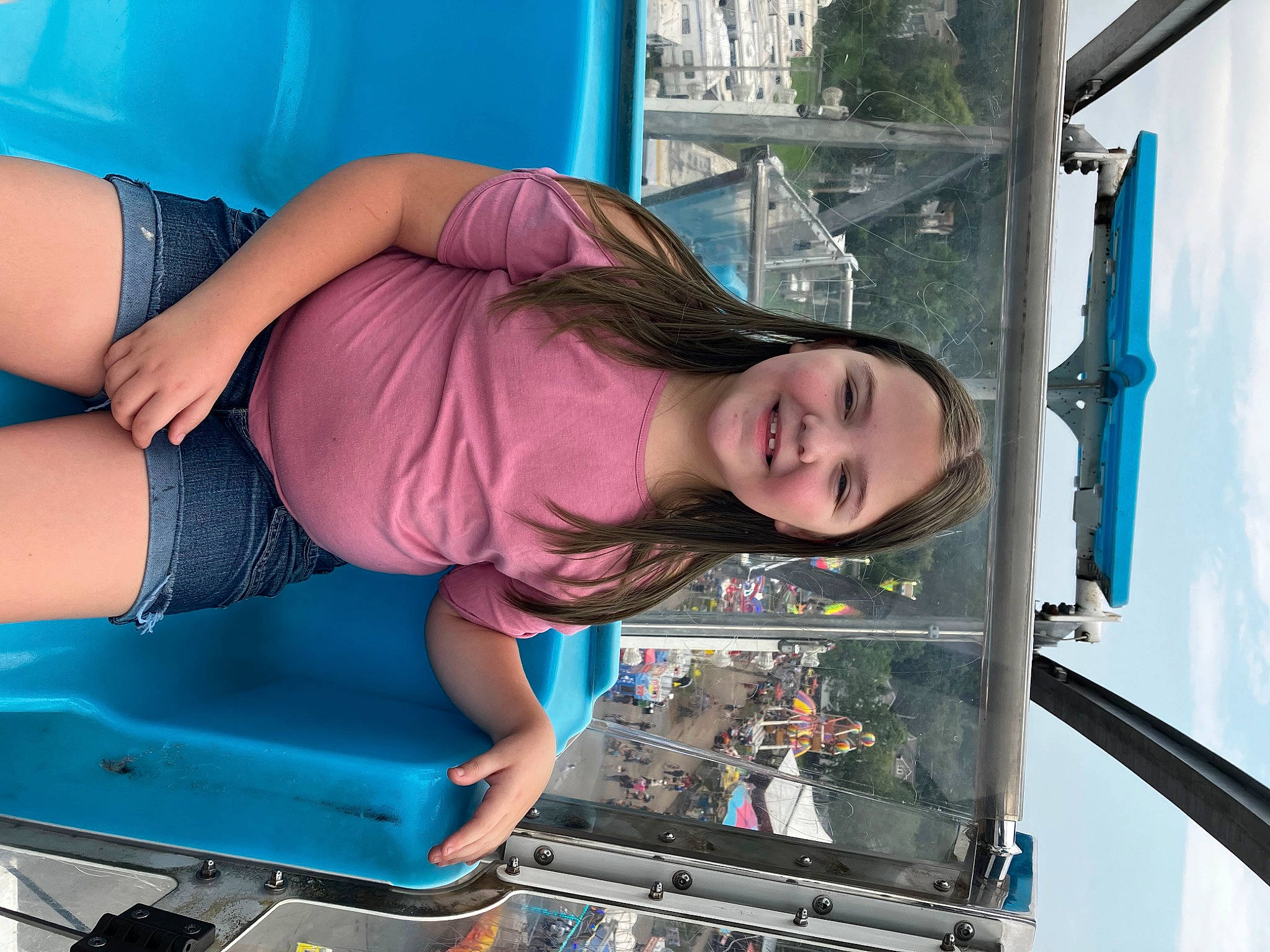 Ariel joined the competition — help win amazing prizes! auto_part, automotive_exterior, automotive_wheel_system, blue, bumper, child, electric_blue, fun, hair, human_leg, joy, knee, leisure, magenta, motor_vehicle, person, smile, snapshot, thigh, tree