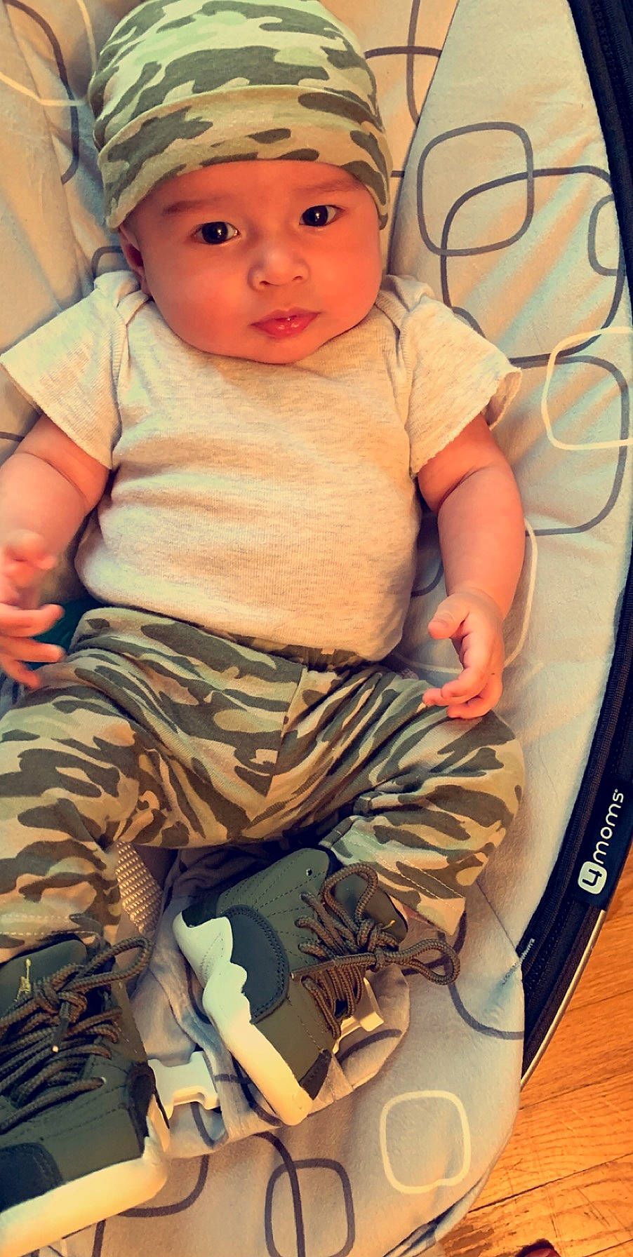 Jaxsyn is registered to the contest to win money with this photo: baby, camouflage, child, headwear, person, skin, toddler