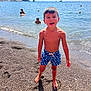 Conrad joined the competition — help win amazing prizes! child, boy, beach, sea, ocean, water, sand, swim_shorts, shore, coast, swimming, sunny, vacation, holiday, portrait, smile, rocks, boats, waves, people