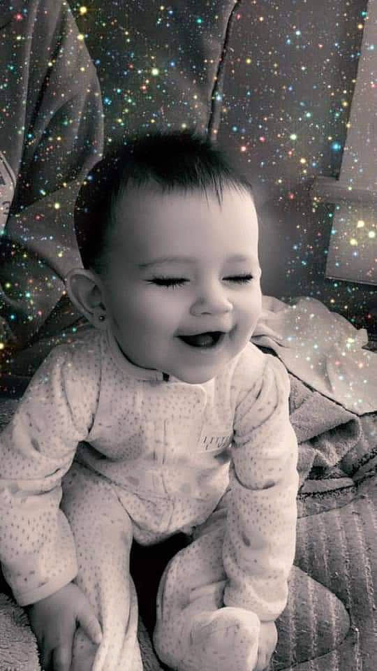 Rayna joined the competition — help win amazing prizes! baby, black_and_white, cheek, child, eye, face, facial_expression, head, monochrome, person, photograph, photography, portrait, portrait_photography, skin, smile, snapshot, snow, toddler, winter