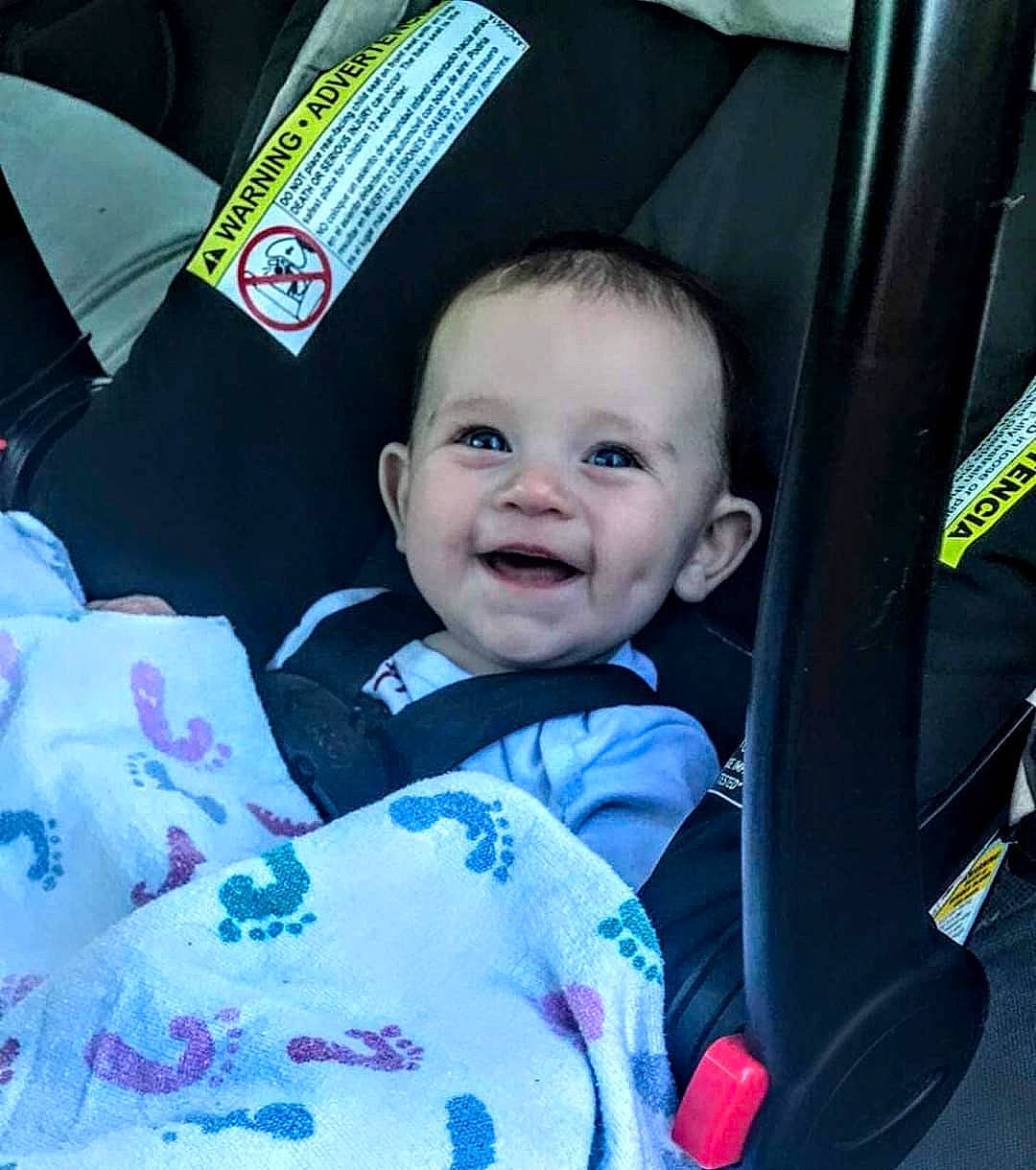Rayna is registered to the contest to win money with this photo: auto_part, baby, baby_carriage, baby_in_car_seat, baby_products, car_seat, cheek, child, eye, face, head, person, product, seat_belt, skin, smile, toddler, vacation
