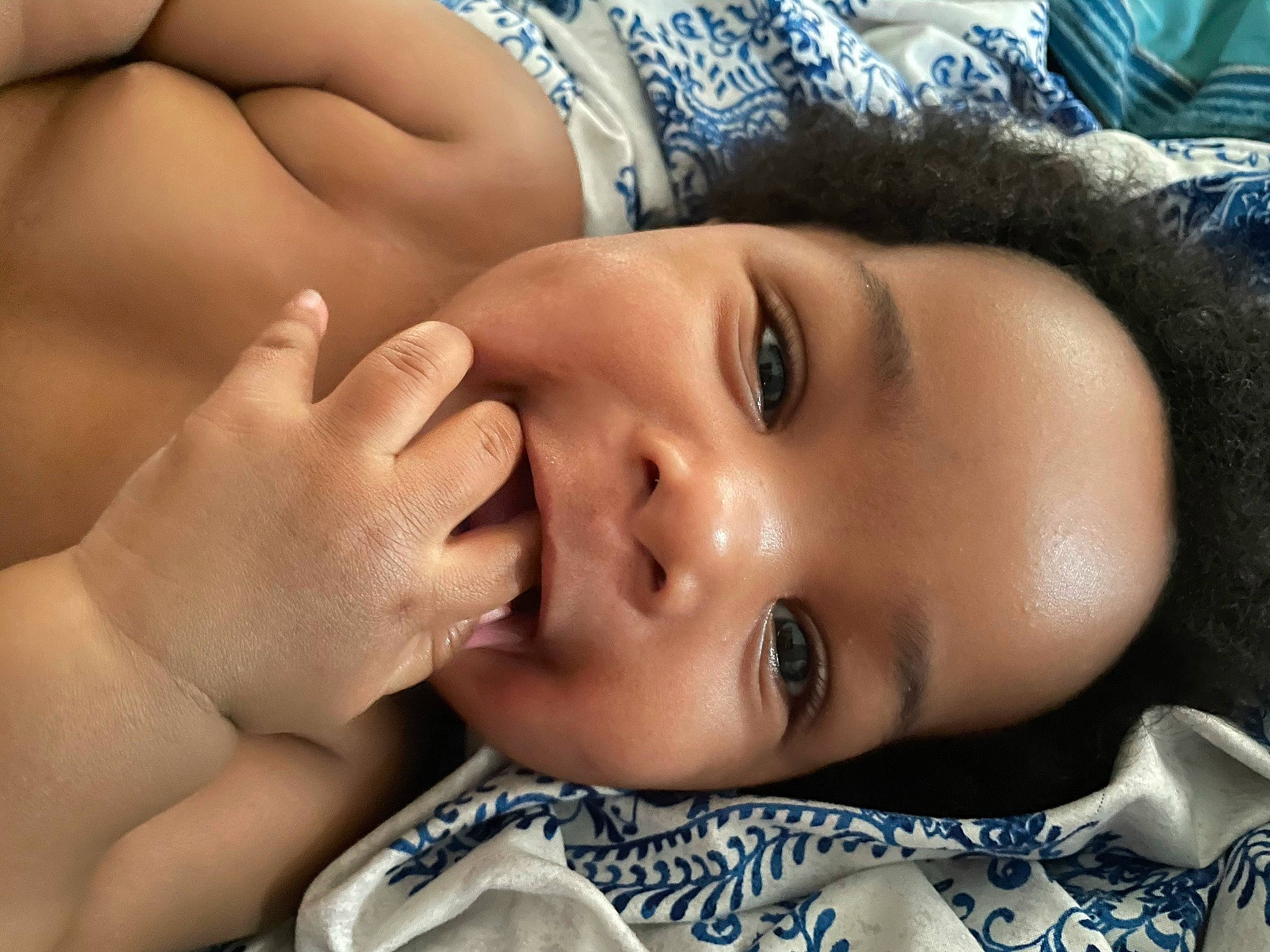 Richie is registered to the contest to win money with this photo: blue, cheek, chin, ear, eye, eyebrow, eyelash, forehead, hair, hand, head, human_body, joint, lip, mouth, muscle, neck, nose, person, skin