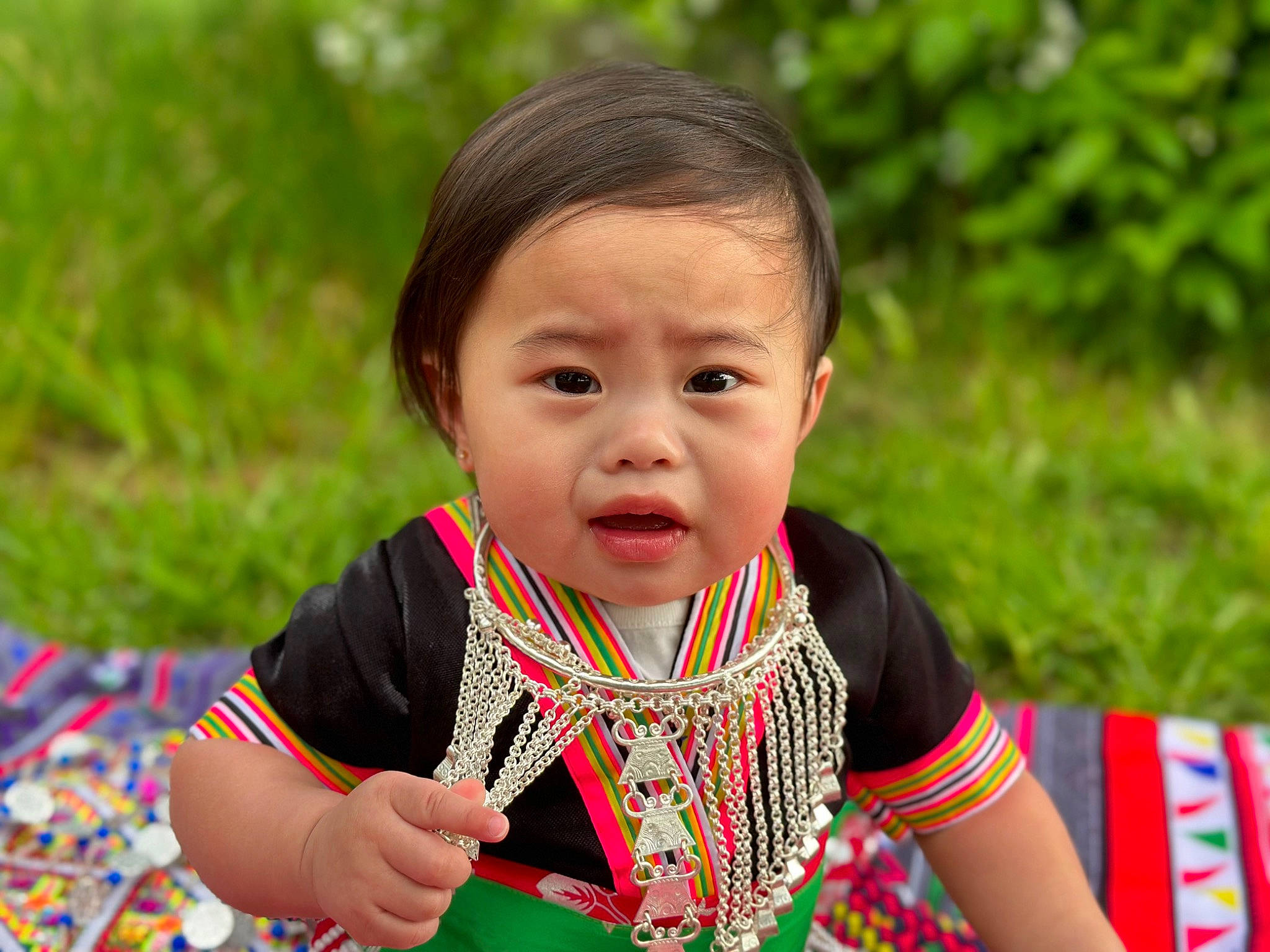 Flora joined the competition — help win amazing prizes! baby, baby_toddler_clothing, child, event, face, fun, grass, happy, leisure, pattern, people_in_nature, person, play, portrait_photography, recreation, sitting, sleeve, t_shirt, toddler, vacation