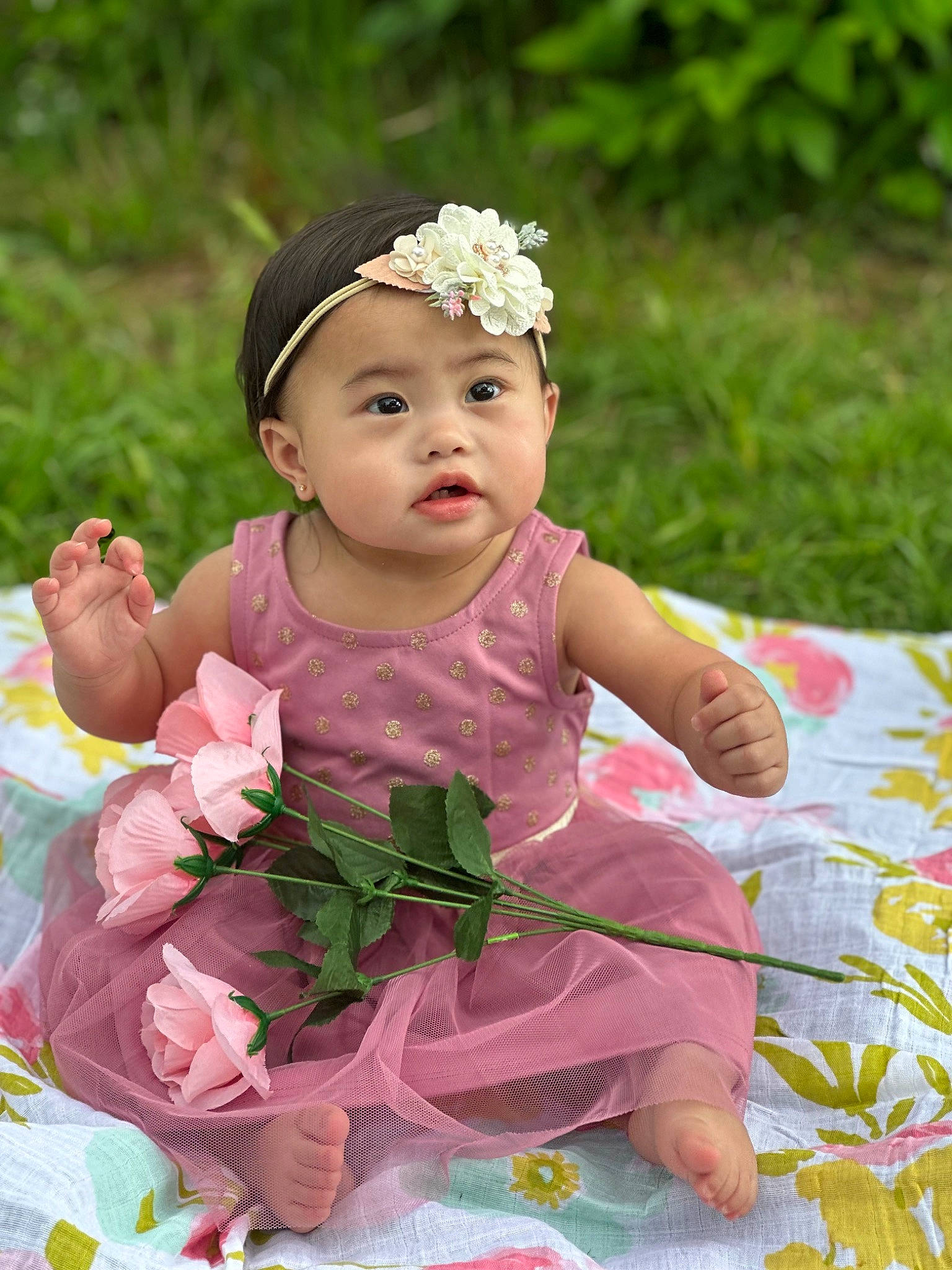 Flora joined the competition — help win amazing prizes! baby, baby_toddler_clothing, botany, child, dress, eye, flower, grass, hair_accessory, hairstyle, happy, head, headpiece, headwear, jewellery, people_in_nature, person, petal, pink, plant