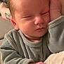 arm, baby, blanket, closeup, cozy, face, family, hand, indoor, infant, newborn, onesie, pajamas, peaceful, pillow, portrait, resting, sleeping, soft_texture, tattoo