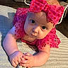 Sabrina is registered to the contest to win money with this photo: baby, baby_fashion, blanket, blue_eyes, bow, child, closeup, clothing, curious, cute, floor, hands, headband, indoor, infant, lying_down, person, pink_dress, portrait, toddler