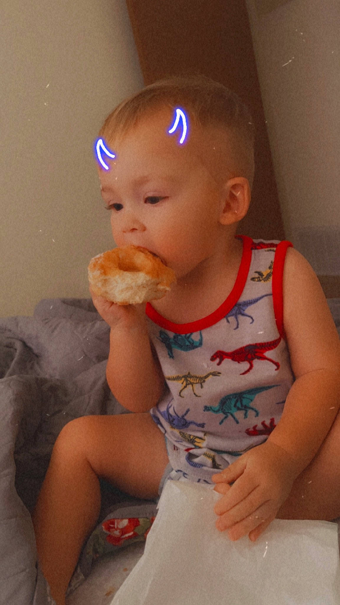 Sawyer is registered to the contest to win money with this photo: arm, baby, baby_toddler_clothing, cheek, child, chin, finger, food_craving, fun, hand, happy, mouth, neck, nose, person, sitting, skin, sleeve, t_shirt, thumb