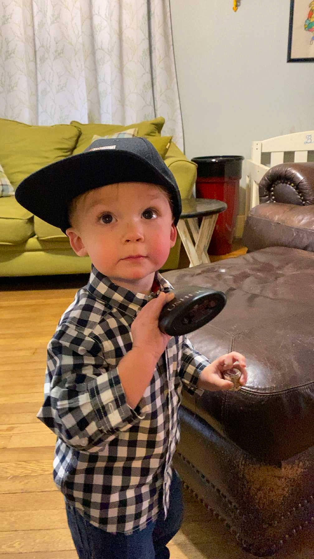 Sawyer joined the competition — help win amazing prizes! baby, child, comfort, curtain, fashion_accessory, fish, flooring, fun, happy, hat, headwear, pattern, person, picture_frame, plaid, room, sitting, sleeve, sun_hat, surprise